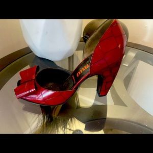 Gorgeous 3” Red leather heels with beautiful bow adornment on the front.